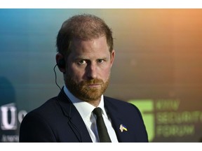 Britain's Prince Harry is due to arrive back in the UK, but without his wife, Meghan, and two children as had originally been planned.