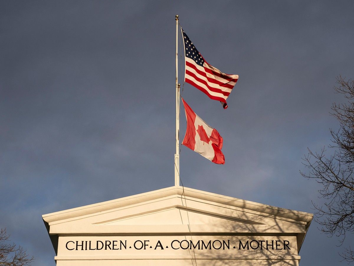  Flags from Canada and the U.S. fly atop the Peace Arch at the Peace Arch Border Crossing in Blaine, Washington, U.S.