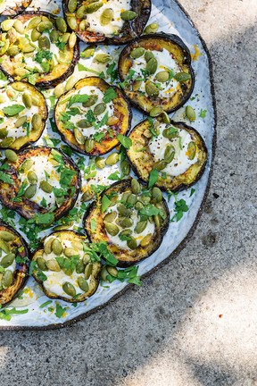 Grilled eggplant with whipped goat's cheese, orange zest and pumpkin seeds
