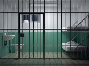 An empty jail cell.