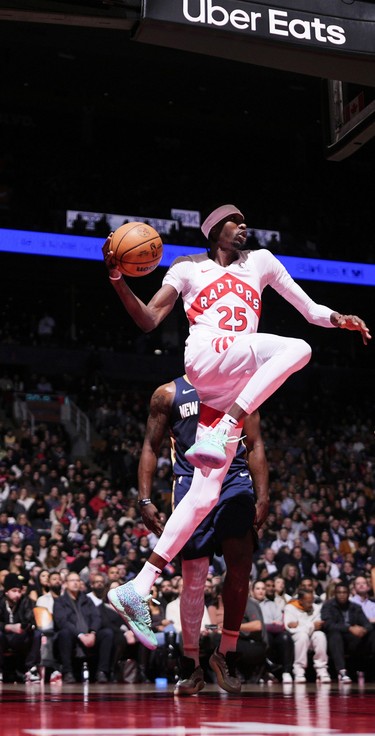 Chris Boucher of the Toronto Raptors passes the ball during the game against the New Orleans Pelicans on Jan. 27, 2025, in Toronto, Ont.