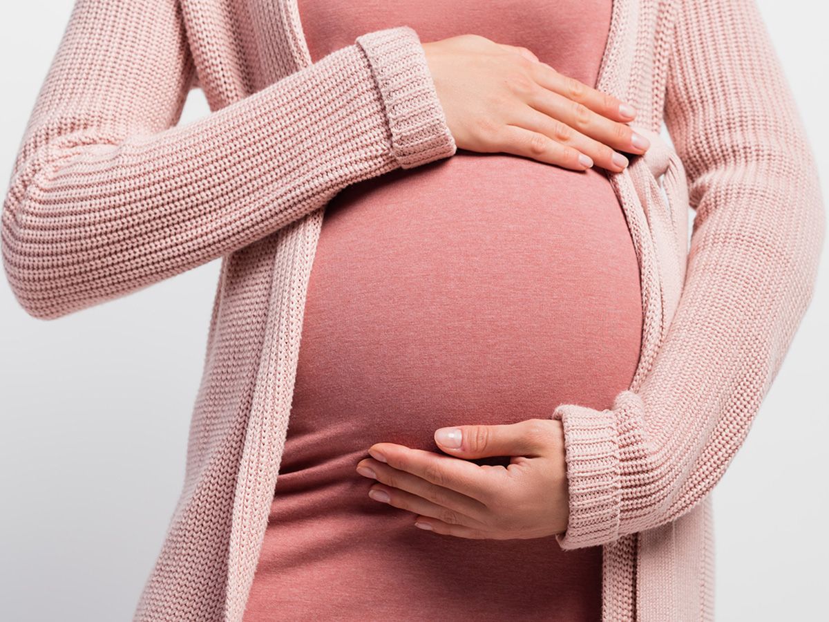 A pregnant woman.