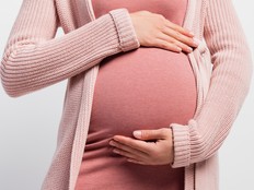 A pregnant woman.