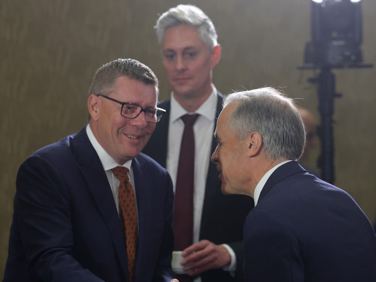 Carney with Scott Moe