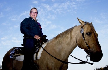 William Shatner rides a horse in a dark outfit while attending the 13th Annual Hollywood Charity Horse Show at Burbank Equestrian Center on April 26, 2003.