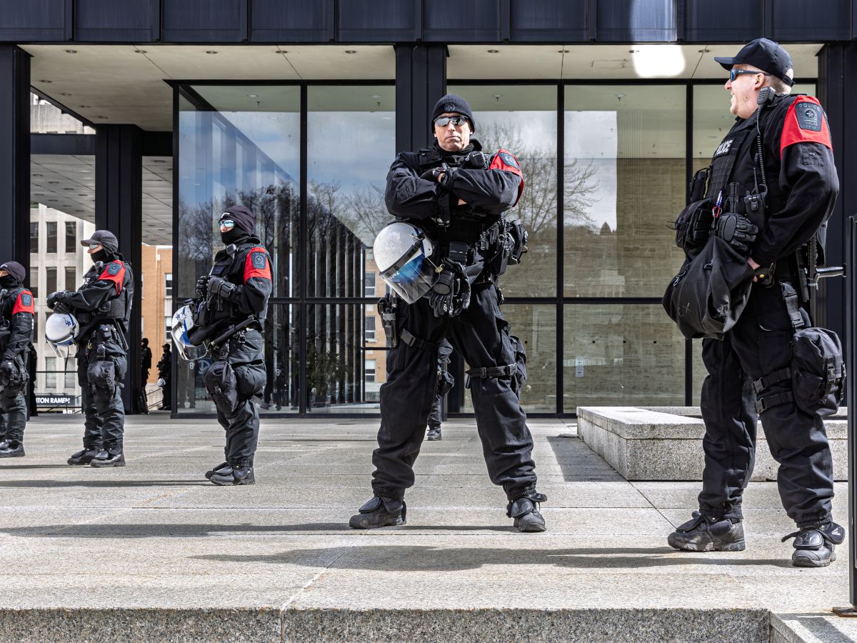 Montreal police guard the Israeli Consulate during an anti-Israel protest in 2025. Montreal police guard the Israeli Consulate during an anti-Israel protest in 2025.