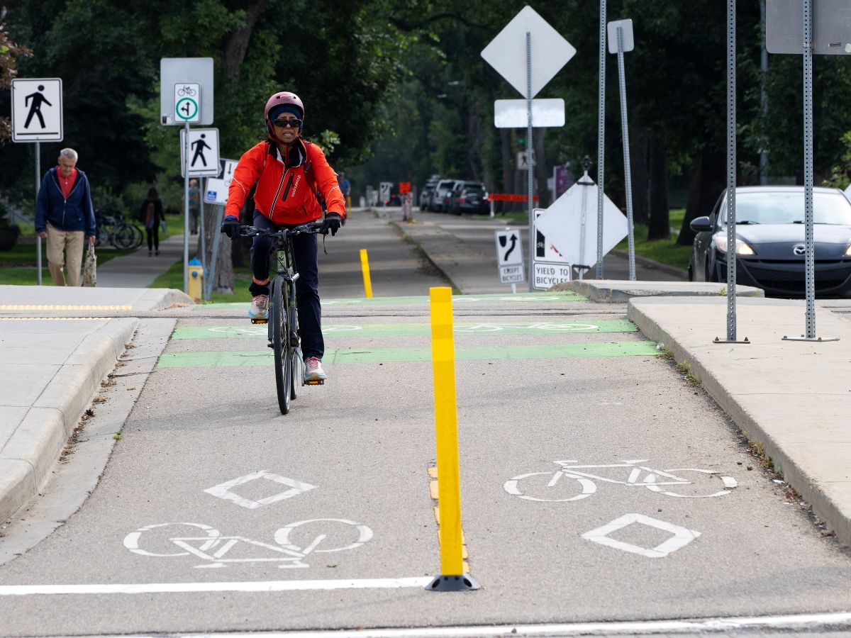 A cyclist makes their way down the 83 Avenue bike lane near Gateway Boulevard, in Edmonton Monday August 10, 2026.