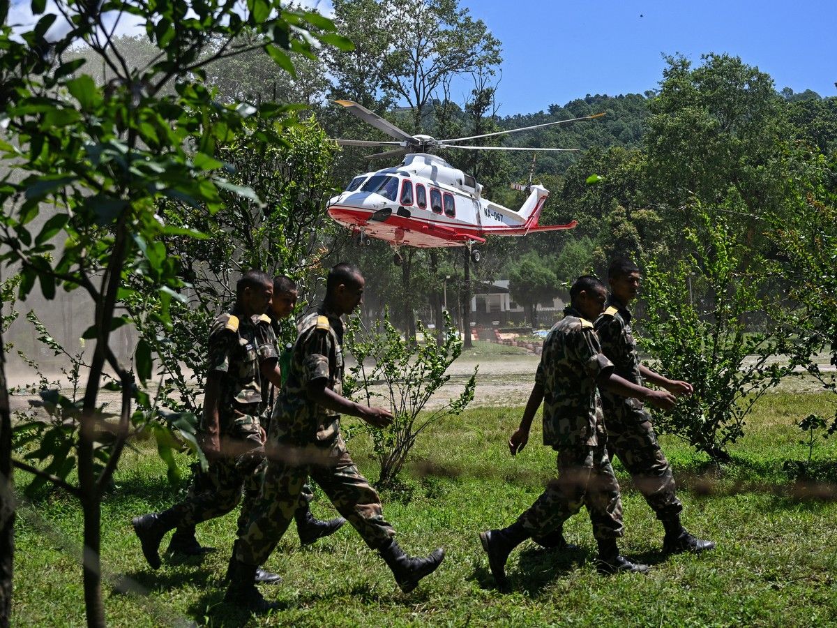 Rescuers race to save over 100 people still trapped in Nepalese hydropower project tunnel