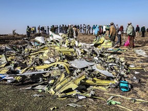 People and airplane pieces.