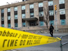 Toronto Police officers work around the scene of a shooting at the US Consulate in Toronto, Canada, on March 10, 2026.