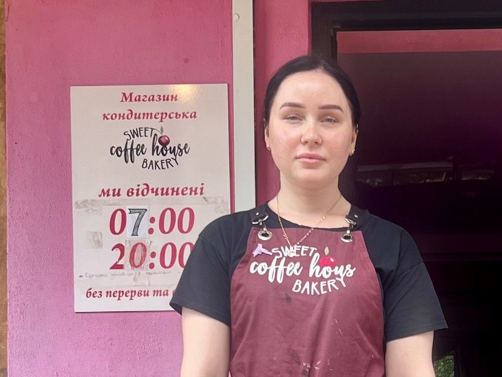 Kateryna Seledtsova outside her Coffee House Bakery in Kramatorsk, Ukraine.