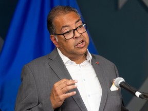 Alberta NDP leader Naheed Nenshi, joined by Service Alberta and Red Tape Reduction critic Gurinder Brar, spoke to media in Calgary on Tuesday, August 25, 2026 criticizing Danielle Smith's position toward the ongoing trade talks with the U.S.