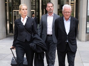 Frank Stronach with his lawyer and driver