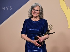 Sally Field holds an award at the Emmy Awards.