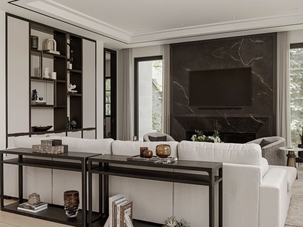 Instead of track lights set into the family room’s coffered ceiling, there’s a marvel of modern technology: a magnetic strip into which wireless pot lights can be placed anywhere along its perimeter.