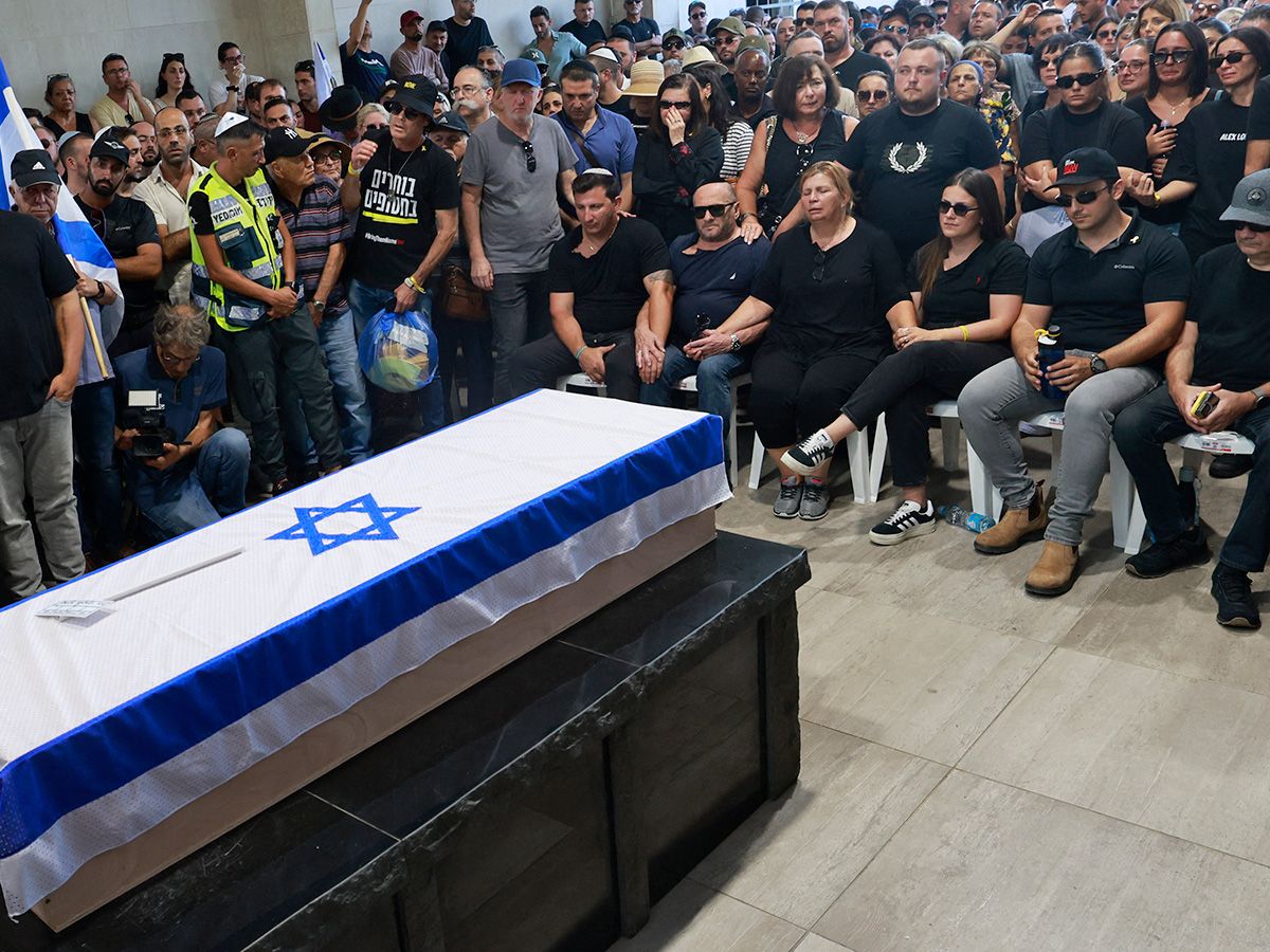 Relatives and friends attend the funeral of Alexander Lobanov, whose body was among six recovered from the Gaza Strip where Israeli hostages were being held by Hamas terrorists since October 7, 2023, at the Ashkelon cemetery in southern Israel on September 1, 2024.