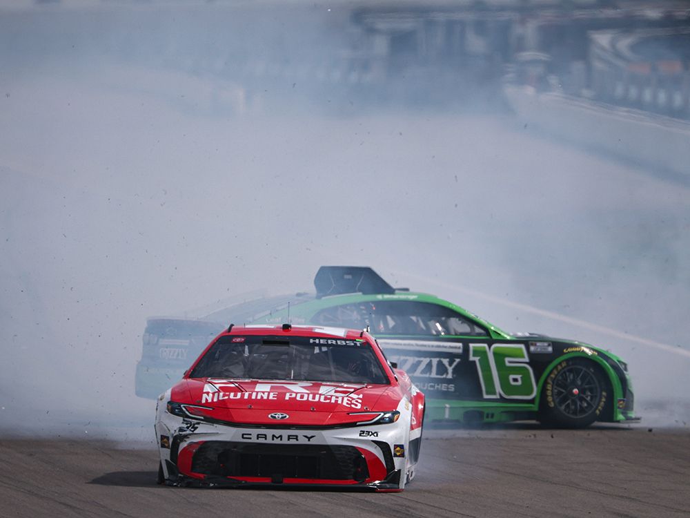 Fre Nicotine Pouches-sponsored driver Riley Herbst (No. 35) and Grizzly Nicotine Pouches-sponsored driver AJ Allmendinger (No. 16) spin after an on-track incident during the NASCAR Cup Series on Sept. 13, in Madison, Ill.
