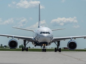 Royal Canadian Air Force CC-330 Husky taxies on the apron at YOW Ottawa International Airport, in Ottawa, on Monday, May 26, 2025.