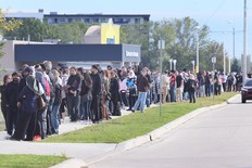 More than 1,000 people lined up outside of the Serbian Centre in Windsor to apply for a job at the new east Windsor Costco on September 23, 2026. (WINDSOR STAR - DAN JANISSE)