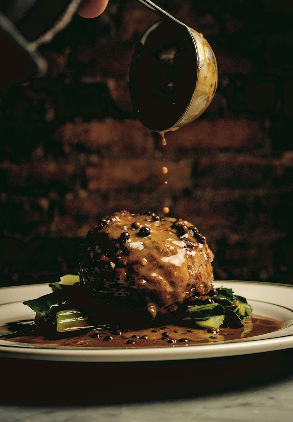 Steak haché tabac-style with sauce au poivre