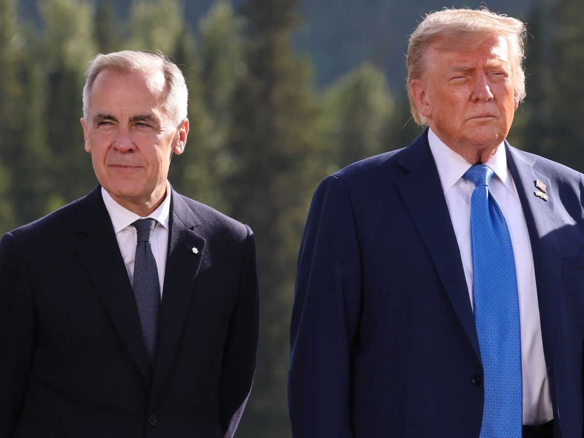 Mark Carney stands alongside Donald Trump in Canada