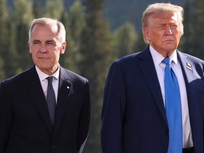 Mark Carney stands alongside Donald Trump in Canada