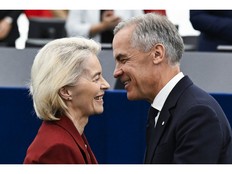 Canada's Prime Minister Mark Carney greets European Commission President Ursula von der Leyen