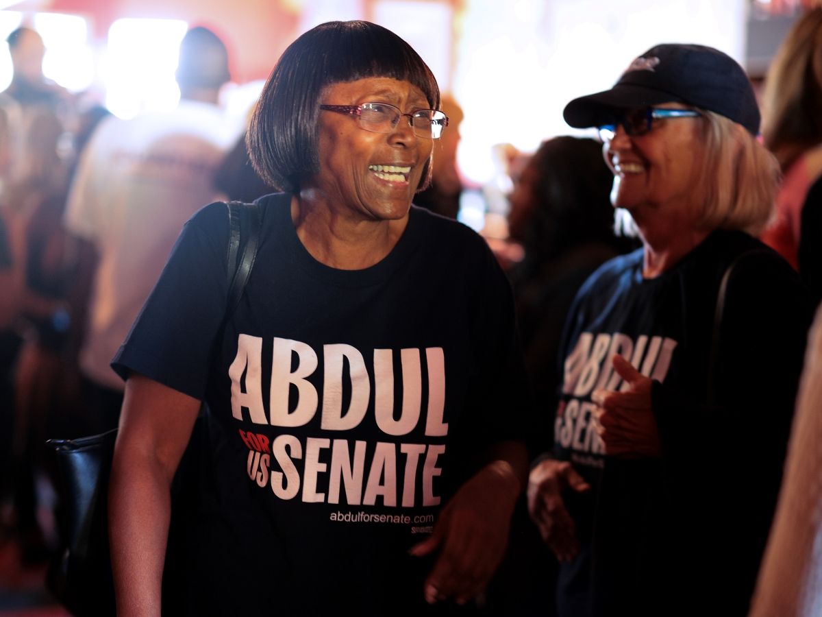 Supporters of Michigan Democratic Senate candidate Abdul El-Sayed attend a campaign event at The Meanwhile Bar on October 08, 2026 in Grand Rapids, Michigan.