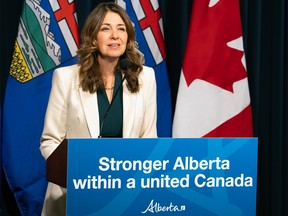 Alberta Premier Danielle Smith speaks to media in Calgary.