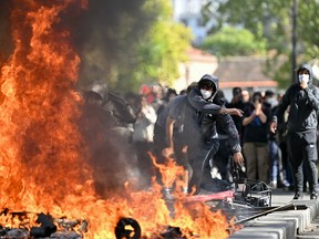 Protesters and fire.