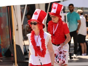 People dressed in maple leafs.