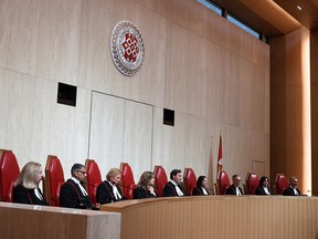 Nine Supreme Court justices.