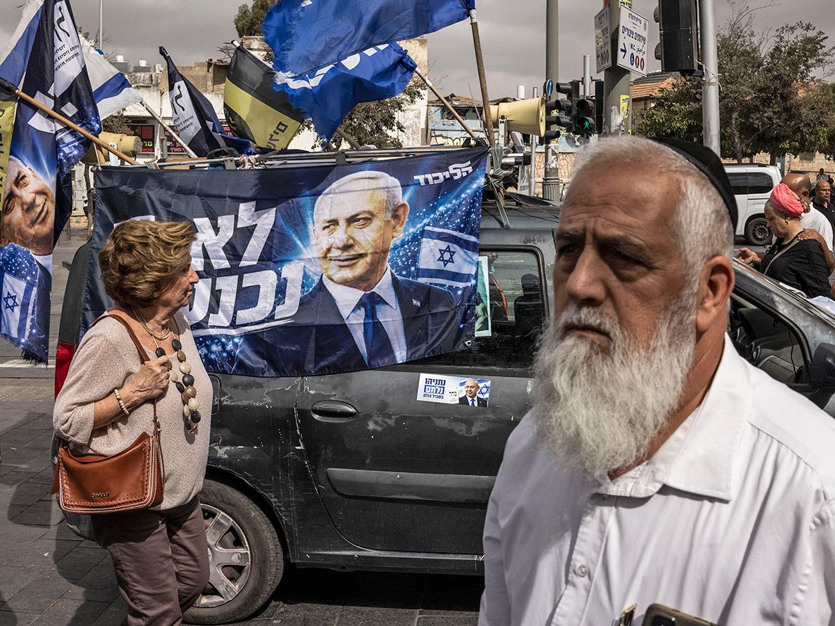 Benjamin Netanyahu photo on a flag.
