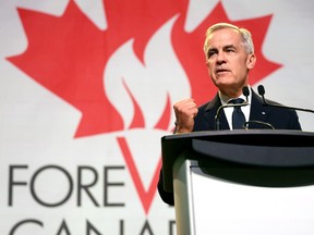 Mark Carney stands behind a lectern with a Forever Canadian logo behind him.
