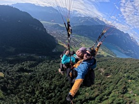 Samantha Peksa floats over the Alps near Interlaken with Skywings Paragliding pilot Mario Jost.