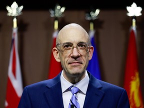 Lawrence David speaks during a press conference on Parliament Hill