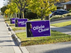 Olivia Chow campaign signs along a road.