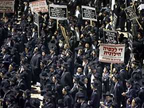 Ultra-orthodox Jews protesting.