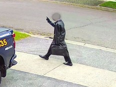 Teen wearing a trench coat.