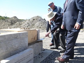 Andy Carswell, 96 years old and Second World War veteran, lays the cornerstone of the Veterans' House Canso Campus in Ottawa, September 16, 2019.