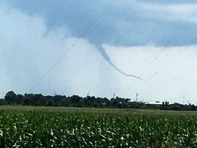 Chatham, Ont. resident Margaret Palmer snapped this photograph of a funnel cloud at 1:43 p.m. on Sunday, July 29, 2018 near Tilbury, Ont. She said she saw three funnel clouds form in the area while on her way to Lakeshore, Ont. (Handout/Chatham Daily News)