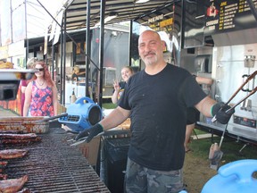 Peter Giannopluss cooks up some fantastic ribs for Grabby's Rib Shack at Ribfest on Sunday July 29, 2018 in Cornwall, Ont.
Lois Ann Baker/Cornwall Standard-Freeholder/Postmedia Network