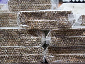 File photo of contraband cigarettes at Kingston Police headquarters in Kingston, Ont.