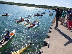 Kayakers at the 3rd annual Bruce Peninsula Multisport Race (now known as the Subaru Bruce Peninsula Multisport Race) at the start of the Suntrail Course at the Bluewater Park pier in Wiarton, Aug. 10, 2013. Photo by Leigh Grigg