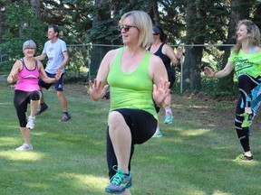 Dancers follow the beat during a Zumba session. POSTMEDIA