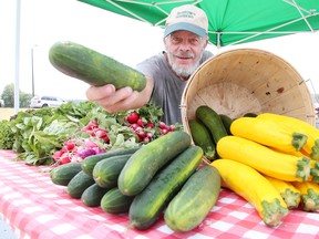 Stuart McCall of McGrows Farms and Gardens shows off some of his vegetables at the York Street location of the farmers market in Sudbury, Ont. on Thursday July 5, 2018.