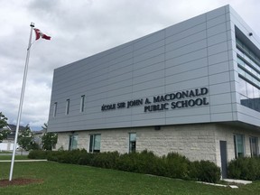 A student at Ecole Sir John A. Macdonald Public School has tested positive for COVID-19.