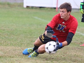 Goal keeper Connor Vande Weghe of the Laurentian Voyageurs men's soccer team makes a save during team practice on Tuesday evening.