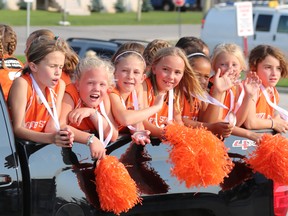 Members of the Owen Sound NorthStars under-11 (one) field lacrosse team lead the N'Stars championship team parade to the Bayshore Aug. 17, 2018, waving orange pom-poms and displaying their provincial bronze medals. The N'Stars finished third at the Ontario Women's Field Lacrosse U11B Provincial Championship in July. Greg Cowan/The Sun Times.