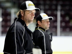 Sarnia Sting head coach Derian Hatcher watches practice at Progressive Auto Sales Arena in Sarnia, Ont., on Thursday, Sept. 20, 2018. Mark Malone/Chatham Daily News/Postmedia Network